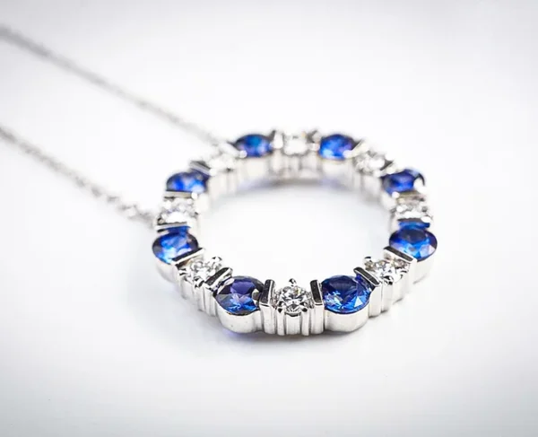 Diamond and Blue Sapphire Circle Pendant