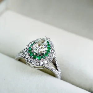 Sparkling Teardrop Emerald and Diamond Ring