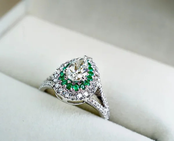Sparkling Teardrop Emerald and Diamond Ring