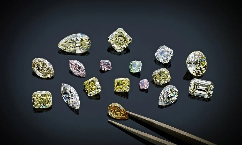 Diamonds - A spectrum of colored diamonds, each reflecting its unique hue and personality
